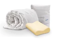 A picture of the Dormeo Autumn/Winter Bedding Bundle. A white Dormeo Memosan Anatomic pillow rests on a white Autumn/Winter 13.5 Tog Evercomfy Dormeo duvet, creating a soft and cozy bedding arrangement. The foam inside of the pillow is also shown. A Dorme