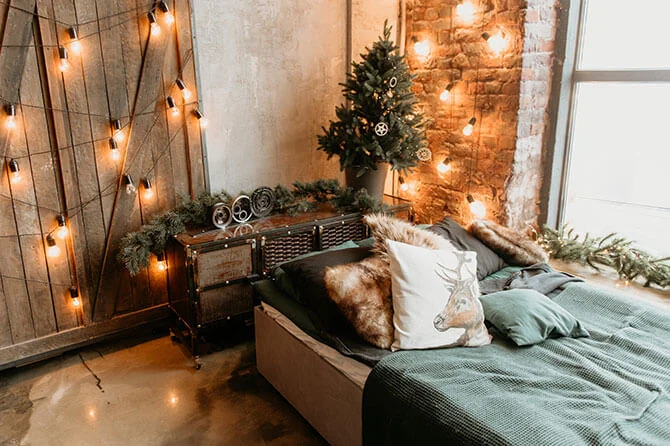 Cosy Christmas nook with vanilla lights and small tree