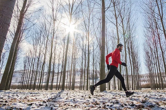 Man running on winter morning