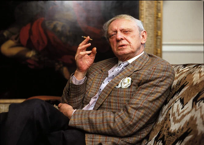 Anthony Burgess smoking a cigarillo