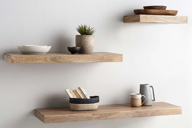 floating shelves with personal touches on them