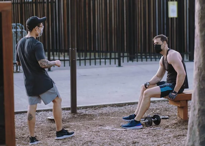 two guys social distancing