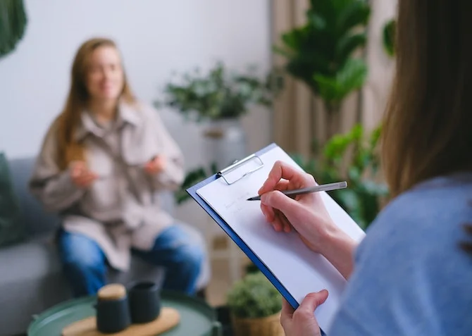 woman talking to a therapist