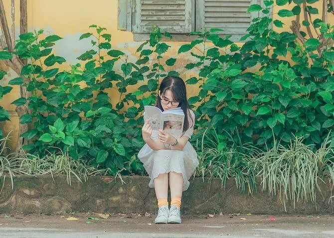 woman reading a book for personal growth