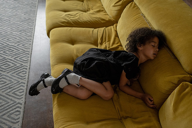 Child sleeping on a sofa