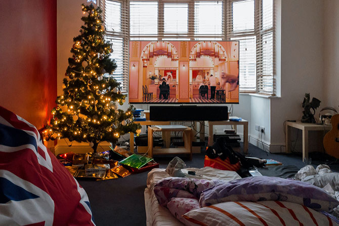 Living room set up for Christmas with floor bed