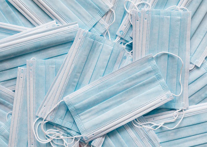 a pile of surgical masks