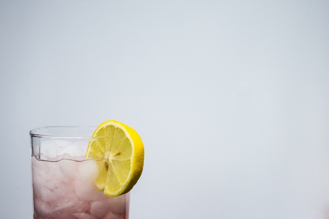 Glass of water with a lemon wedge